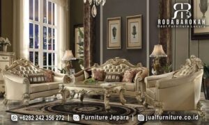 Set Sofa Tamu Mewah Jepara Sovrano Kesan Refined FS1080 terbuat dari kayu jati dengan finishing doff gold, memancarkan elegan yang klasik dan nyaman untuk ruang tamu Anda.