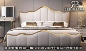 Tempat Tidur Mewah Modern Palermo Pengerjaan Detail FS1033 dari kayu jati dengan finishing doff gold yang elegan, memastikan tidur yang nyaman dan bergaya.