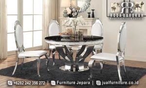 Jual Meja Makan Stainless Jepara dengan desain modern minimalis, kaki stainless steel melengkung, dan busa tebal, sempurna untuk setiap ruang makan.
