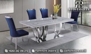 Model Meja Makan Mewah Stainless Siena Bernuansa Antik FS1146 menghadirkan elegan modern dengan kaki oval dan finishing krom, sempurna untuk ruang makan Anda.