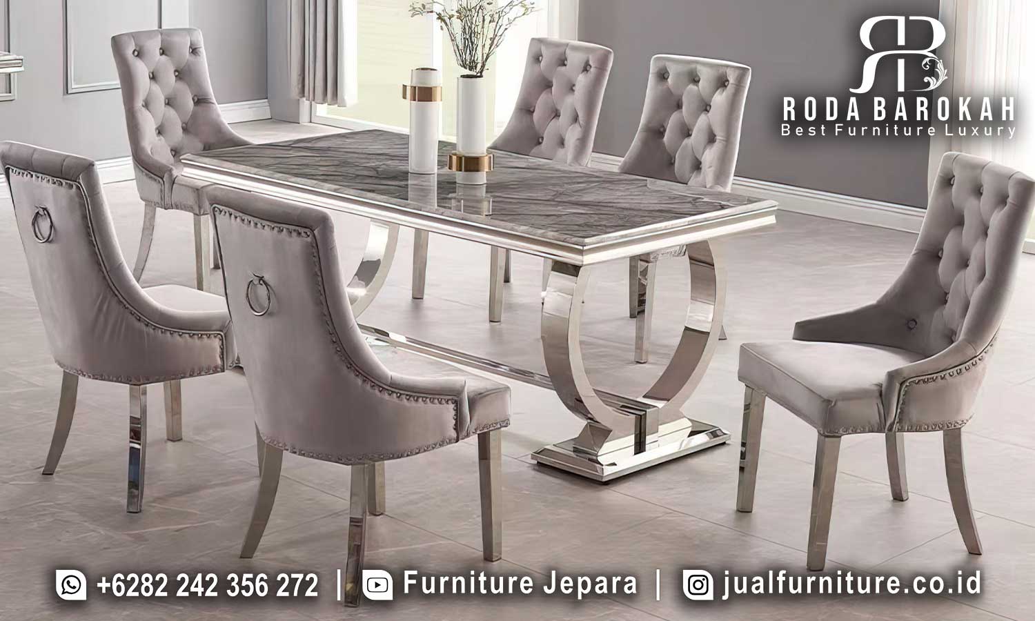Meja Makan Stainless Villa Detail Ornamen FS1339 hadir dengan kaki stainless steel melengkung dan finishing krom, sempurna untuk gaya minimalis modern di rumah Anda.